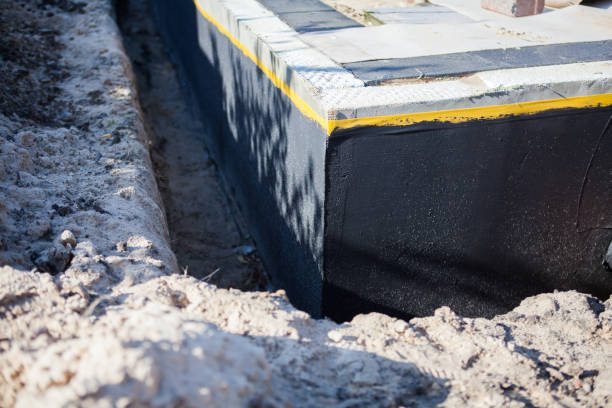 Professional Exterior Waterproofing technician working in Amelia, OH